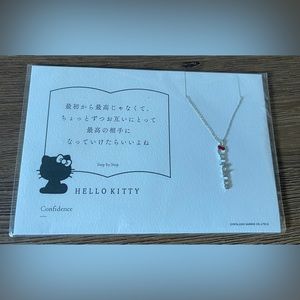 HELLO KITTY-NWT Silver Tone "Confidence" Pendant with red bow and Chain